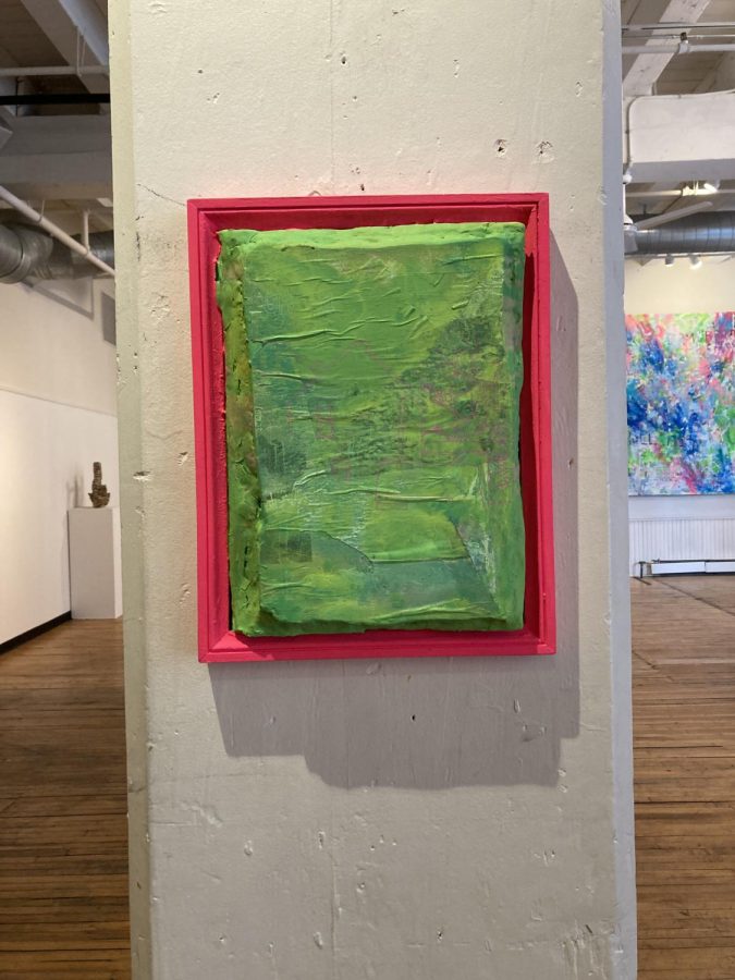 PINK AND GREEN. Residue by Andrea Bagdon shows layered paint with a neon pink border. 