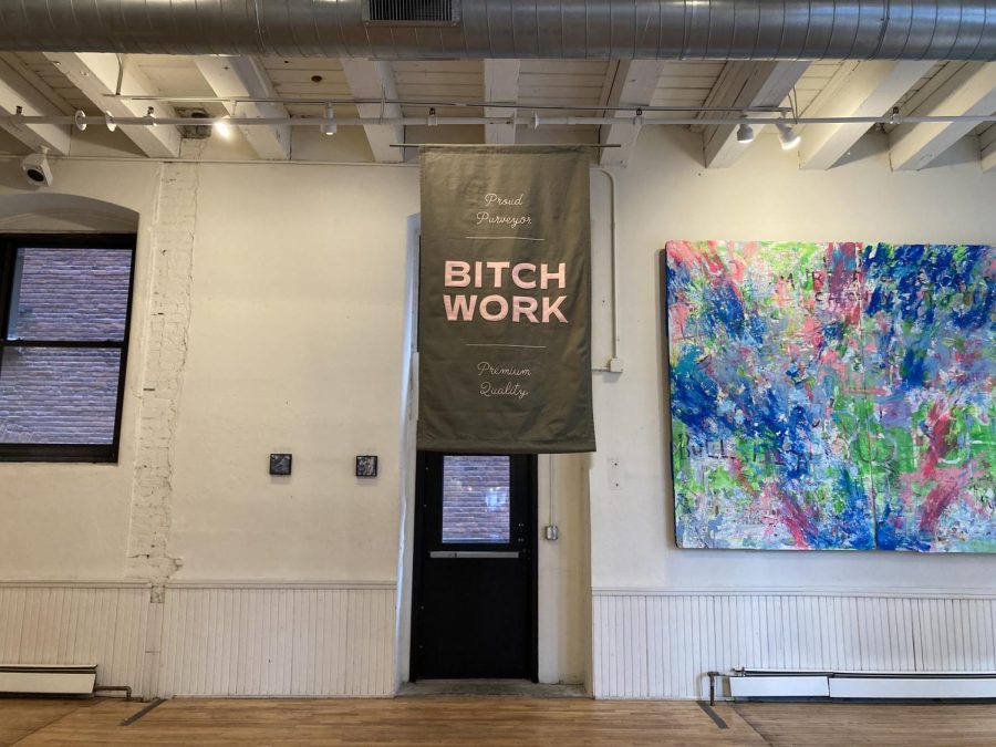 BANNER. Bitch Work by Kelsi Sharp is a banner in the center of the gallery that captures a broad message. 