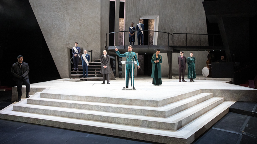 DEADLY DENMARK. Hamlet takes place on a bare, gray stage with three levels and a balcony, and the actors occasionally appear at floor level with the audience. The blandness of the backdrops allowed for complete focus on the acting and costume design, which were far more interesting.