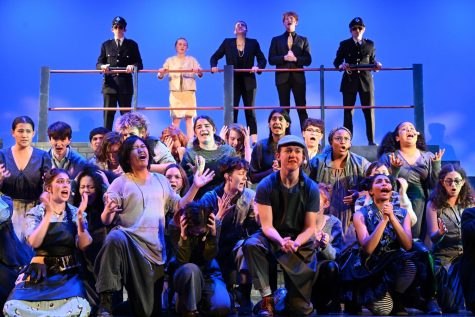 START WITH A BANG. In the opening musical number of Urinetown, everyone sings in different tones and timings, creating a chaotic tone from the start of the show.