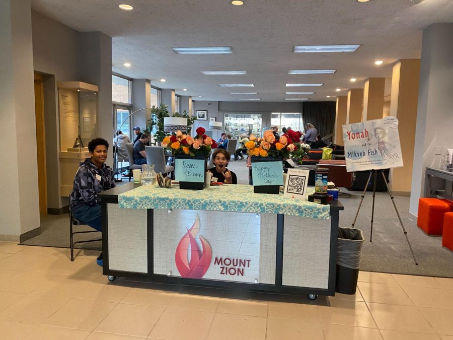 FLORAL FUNDS. The confirmands at Mount Zion Templehost a plant sale to raise money for the temple.