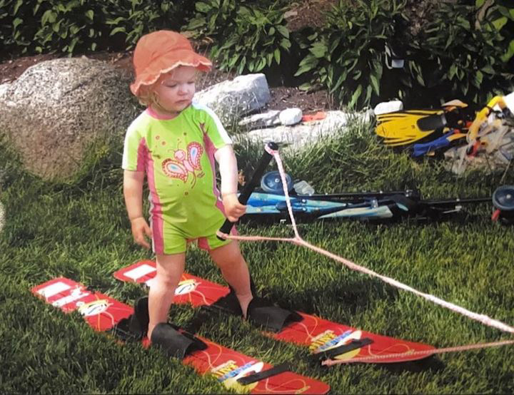 Toddler Nikola Barkwell practices waterskiing on her lawn before she learned on the water.