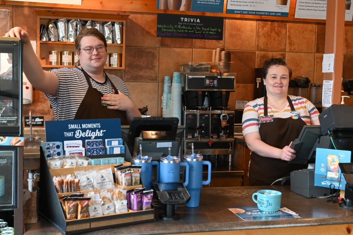 FRIENDLY COWORKERS. This coffee shop stays open from 6 in the morning to 8 at night with these courteous workers. Making coffee, chatting with regulars, and washing dirty dishes are some of the many things they do each day as Caribou employees. “I like making iced caramel lattes,” said one of the workers. Caption by Elliott