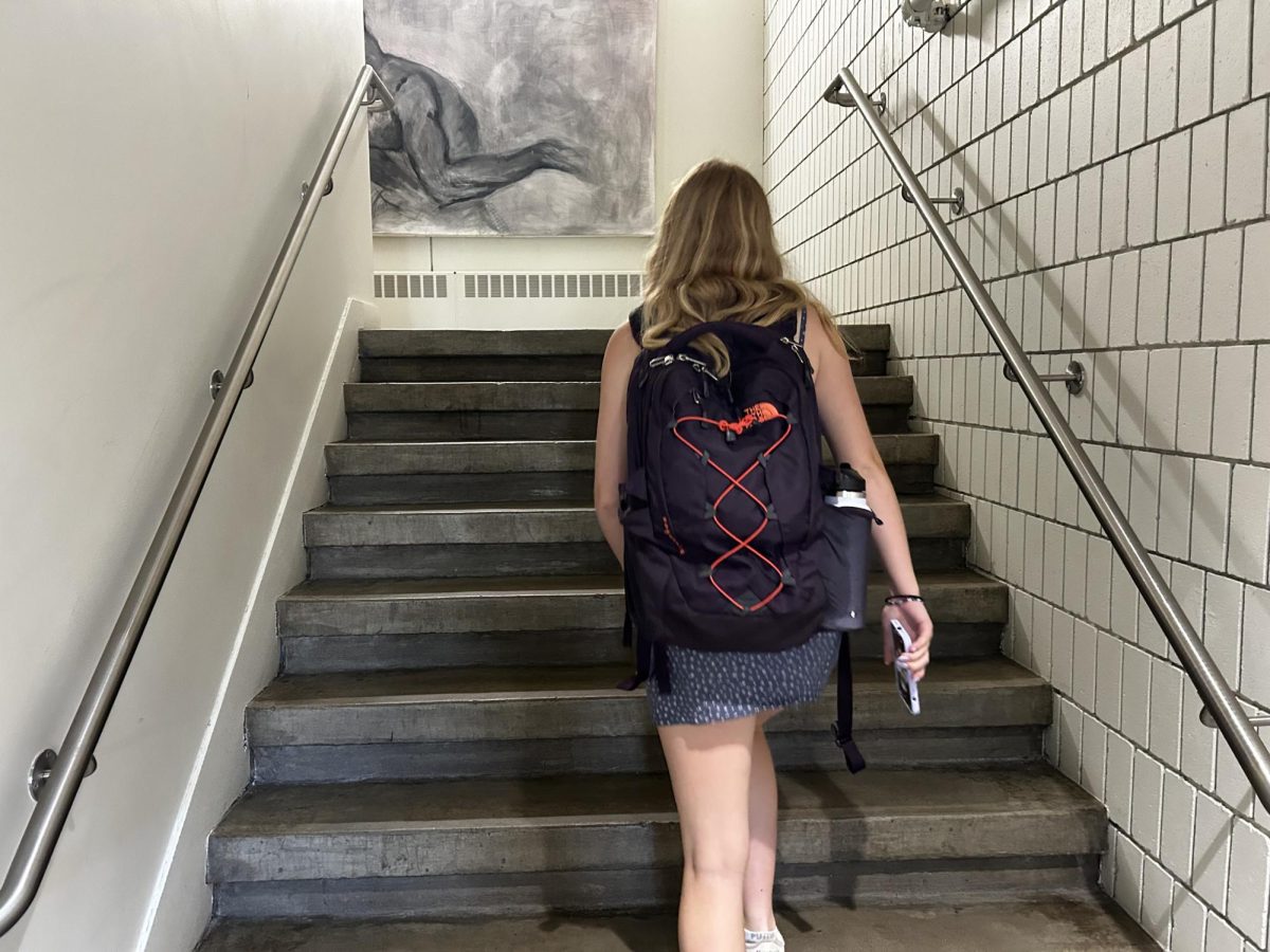 SCHOOL IN STYLE. Varsity volleyball captain Nadia Degnan dressed formal for her first day of school, according to theme. Degnans first game of the season in tonight at 7 p.m. against South Saint Paul at SPA.