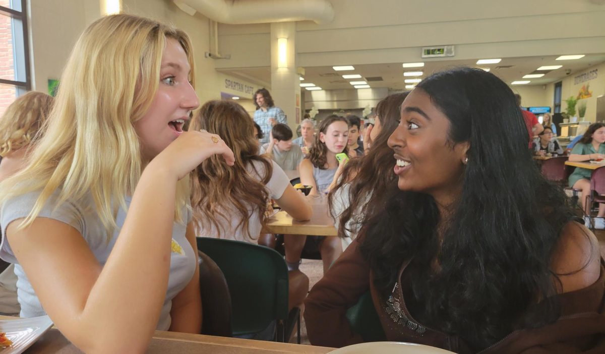 SUMMER DEBRIEF. Sophmores Sophia Donahue and Shefali Meagher argue about movies watched over the summer. 21st Century Girl was worth crying over, Donahue said. The pair will have a lot to catch up on at lunch over the next couple weeks.