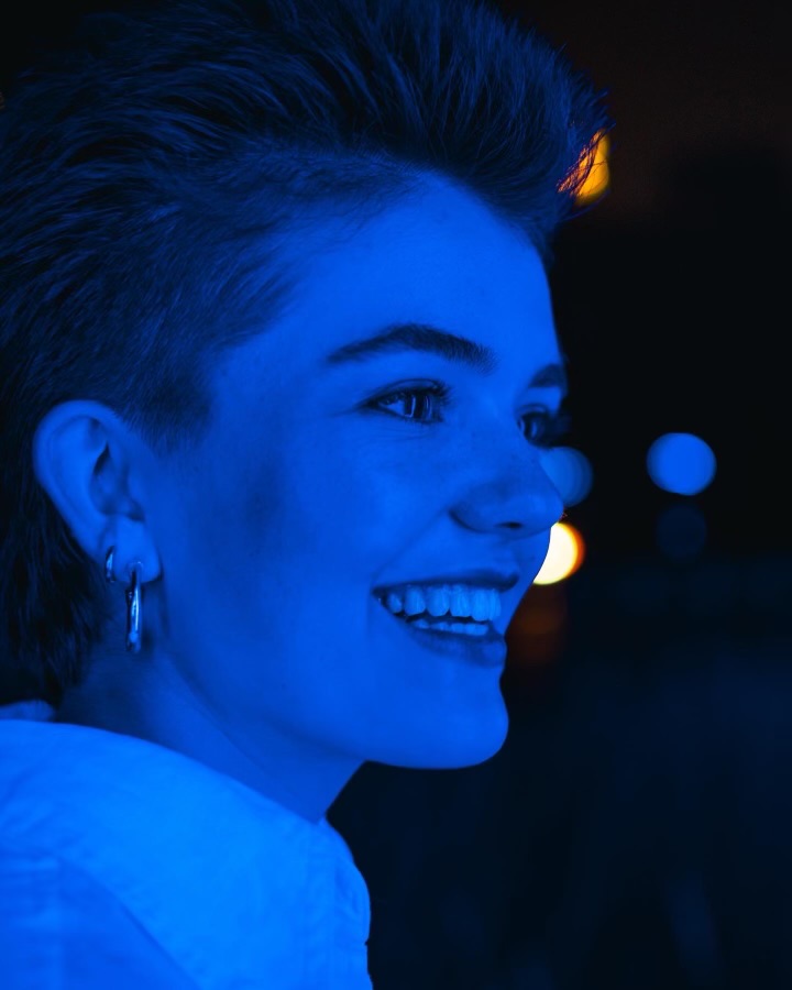 ALL SMILES. Senior Bridget Keel smiles wide in her senior photos done by the student run photography business Starlight Portraiture run by students Taylor Barkwell and Elliot Sjaastad. (Starlight Portraiture)