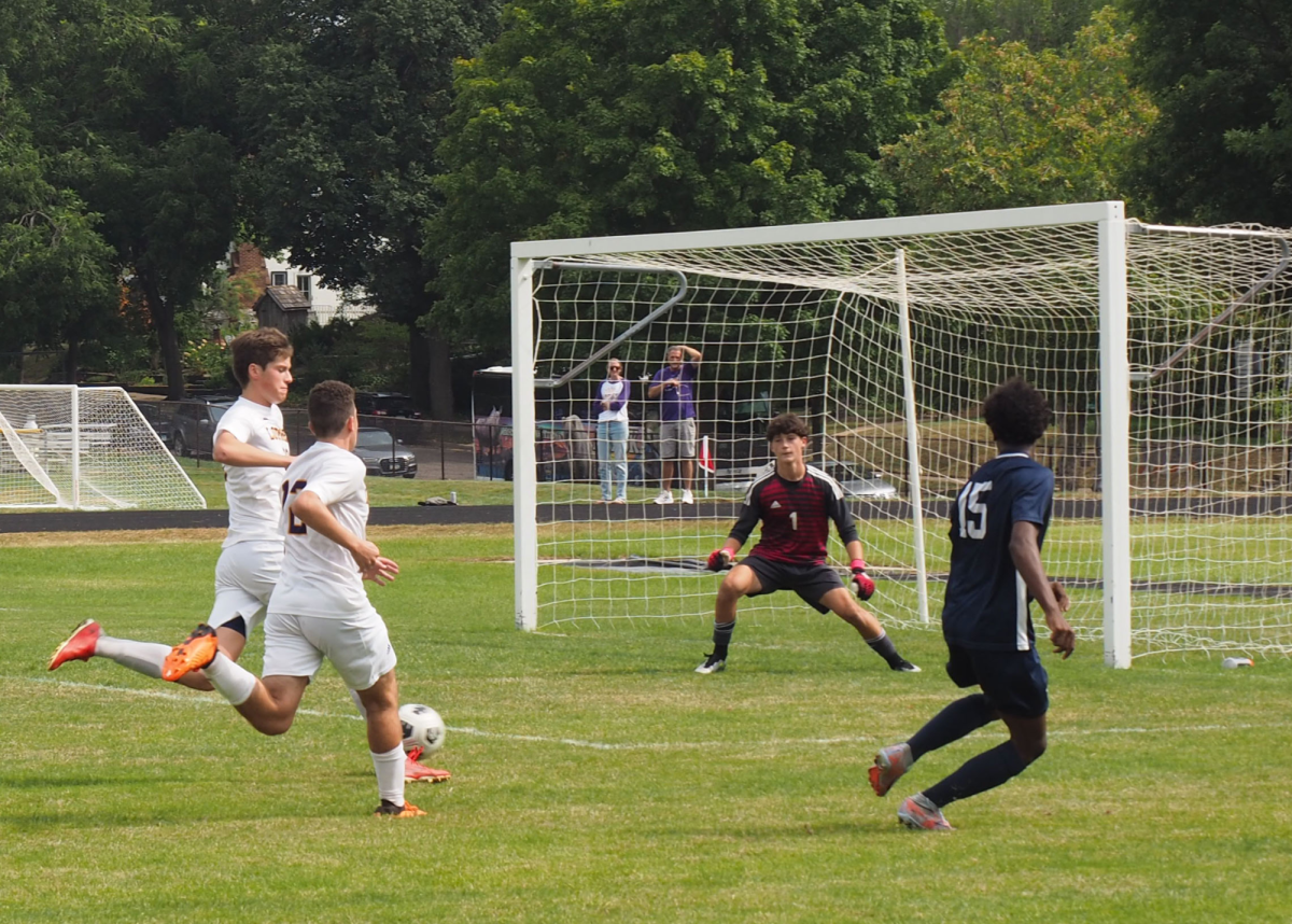 MISSION FAILED. Striker Mas Kouakou attempts to score a goal, but the opposing defense intercepts the ball. “We had three games this week. And were just all drained,” Mas said. 
