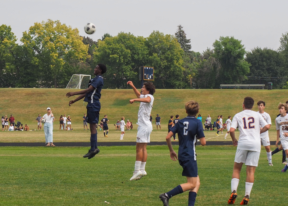 Boys Varsity Soccer had their third game of the week in a close match agaisnt even matched Rochester Lourdes.