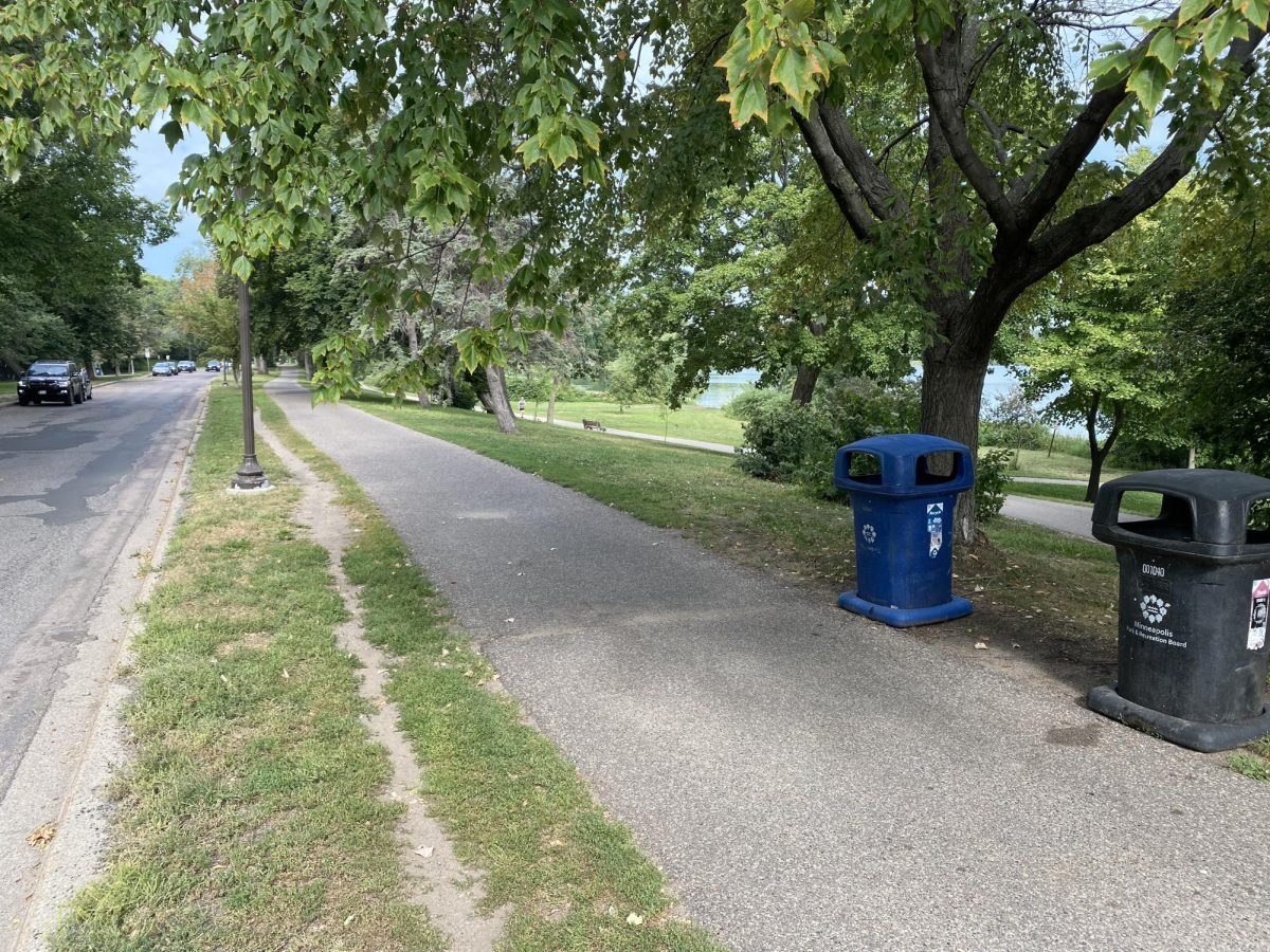 ROUND THE LAKES. Biking on the Grand Rounds in Minneapolis is a nice way to experience the citys alluring parks and lakes. This picture is taken at Lake of The Isles. All of the lakes are connected by bike/walking path