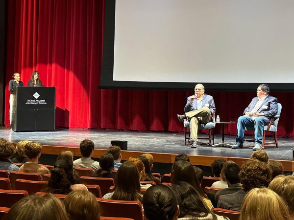 INDIGENOUS INSPIRATION. Freshman Stella Hunter and junior Julia Taylor ask speakers
Reverend Robert Two Bulls and Robert Blake questions collected before the assembly.
The two spoke about people who influenced them and the action they’ve taken to build
infrastructures that solve local issues, especially pertaining to Indigenous communities.