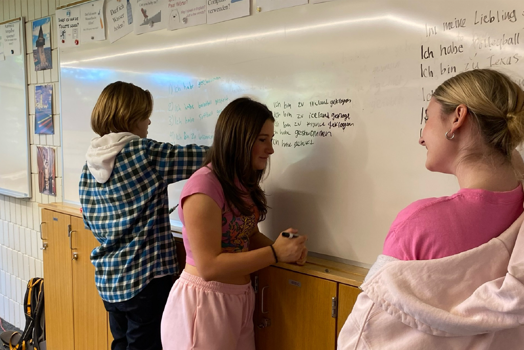 FACE TO FACE. German II students work on a writing assignment together.