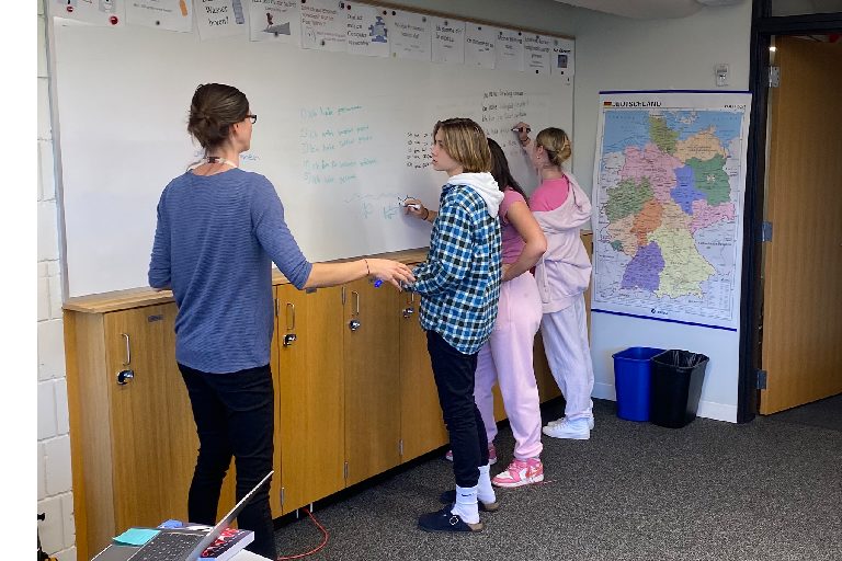 LOCKED IN. German teacher Rachel Ruddick talks to her German II students in her class of 6 on Wednesday.