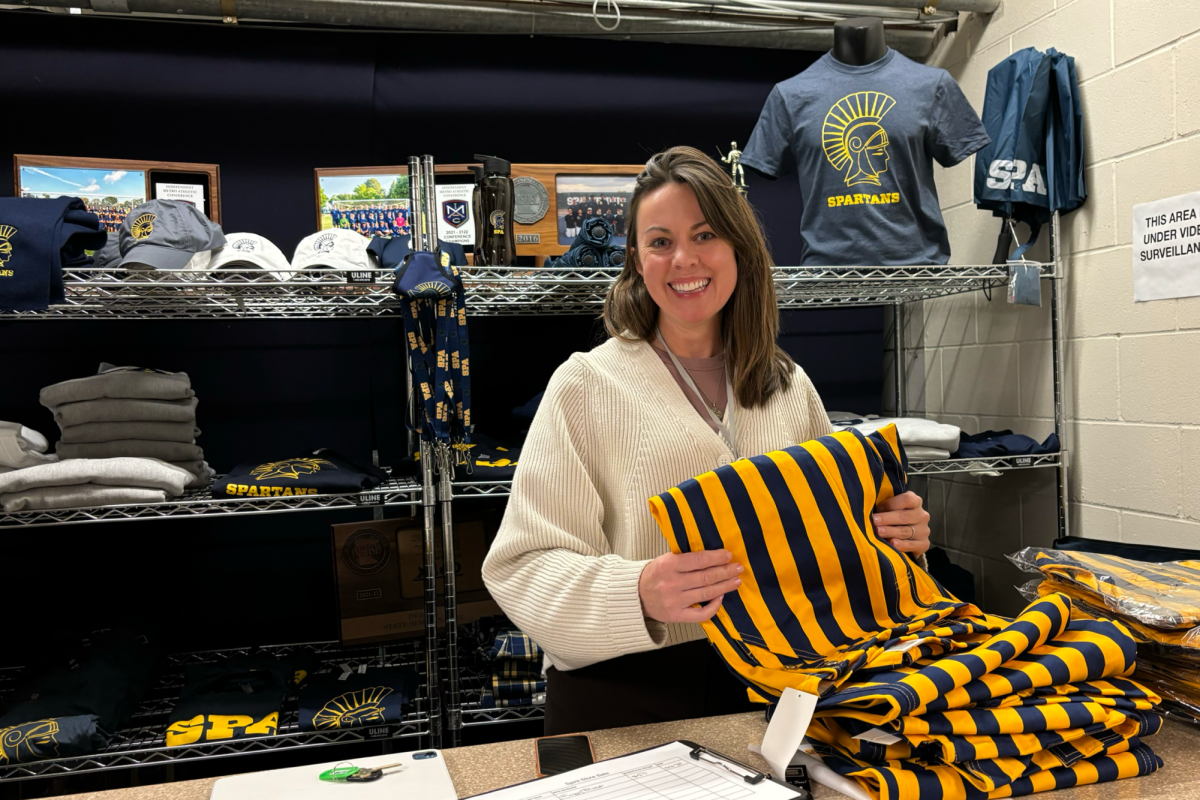 RESTOCK. SPA parent and leading co-organizer for the Spirit Store Katie Miltner counts and folds new just-in orders. She shares not just new designs but also near-future goals. I want to start an Instagram for the Spirit Store... so students can see the new products, Miltner said.