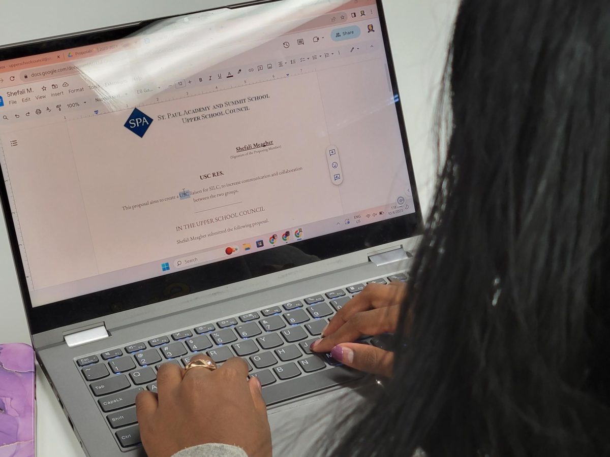 MAKE A CHANGE. USC sophomore representative Shefali Meagher looks over the SILC and USC liaison proposal she wrote. "I think this [liaison] would be a good opportunity [for] USC and SILC," Meagher said.