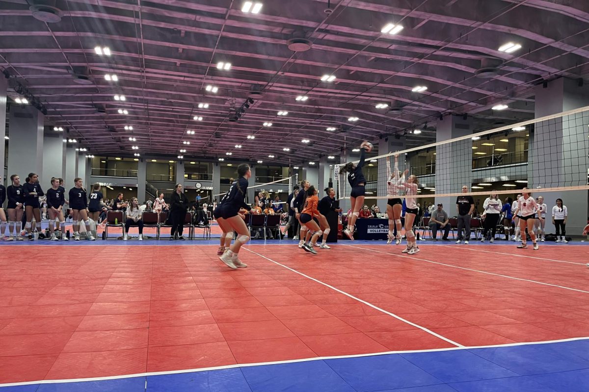 BIG SWING. Freshman Murphy Miltner goes up for a kill at a volleyball tournament on her Kokoro 14-1 team. “You get to play teams from all over, like Hawaii. It’s fun because I get to meet people I wouldn’t know otherwise,” she said. (Submitted Photo: Murphy Miltner)