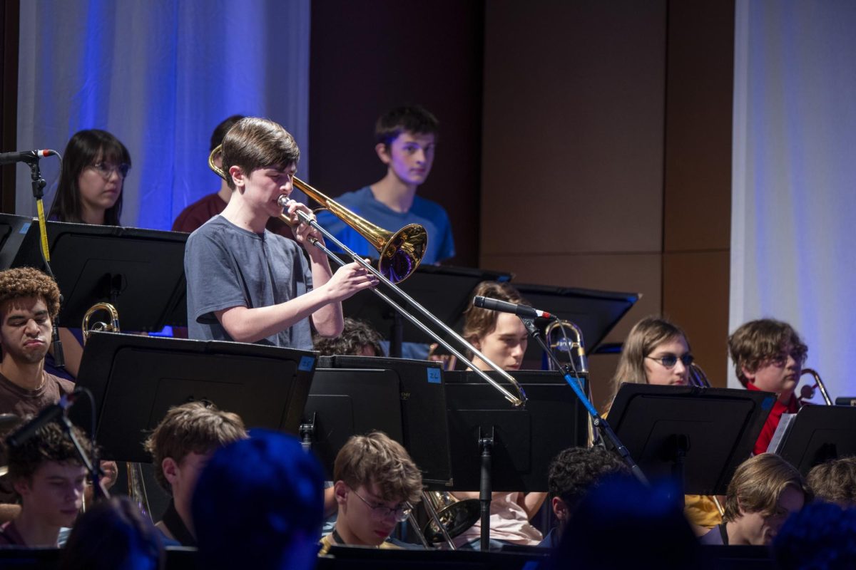 JAZZ HANDS. The Jazz Band performed “Children Of Sanchez” by Chuck Mangione. Sophomore Roman Farley plays his solo part on the trombone.