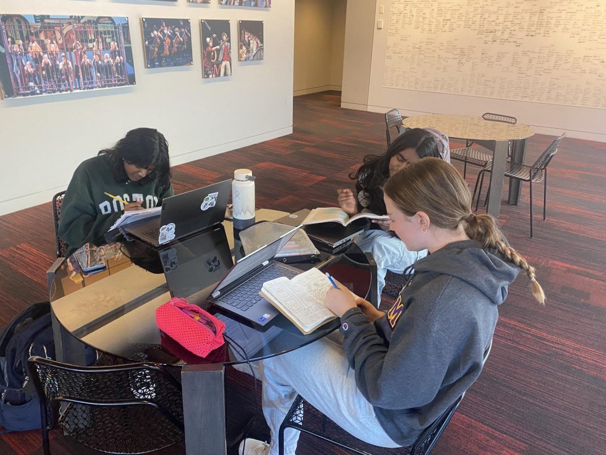 Sophomores Ella Bond, Sona Jain, and Shefali Meagher study together in preparation for an exam.