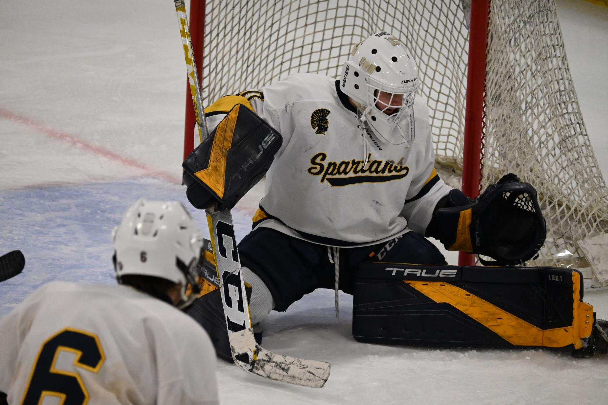 OVERCOMING OBSTACLES. Senior Isak Bildtsen now plays as the starting varsity goaltender for the boys hockey team. However, he has battled for this position since sophomore year: “I couldn’t actually play in a game [that year] for like two and a half months. [But] I was able to actually play in the last varsity game of the season before sections against Highland,” he said.