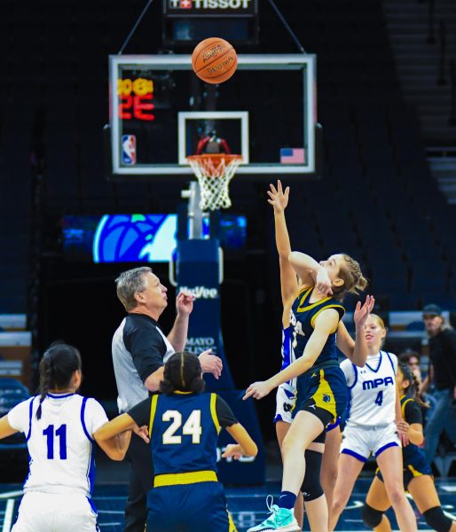 Varsity basketball teams take on MPA at Target Center