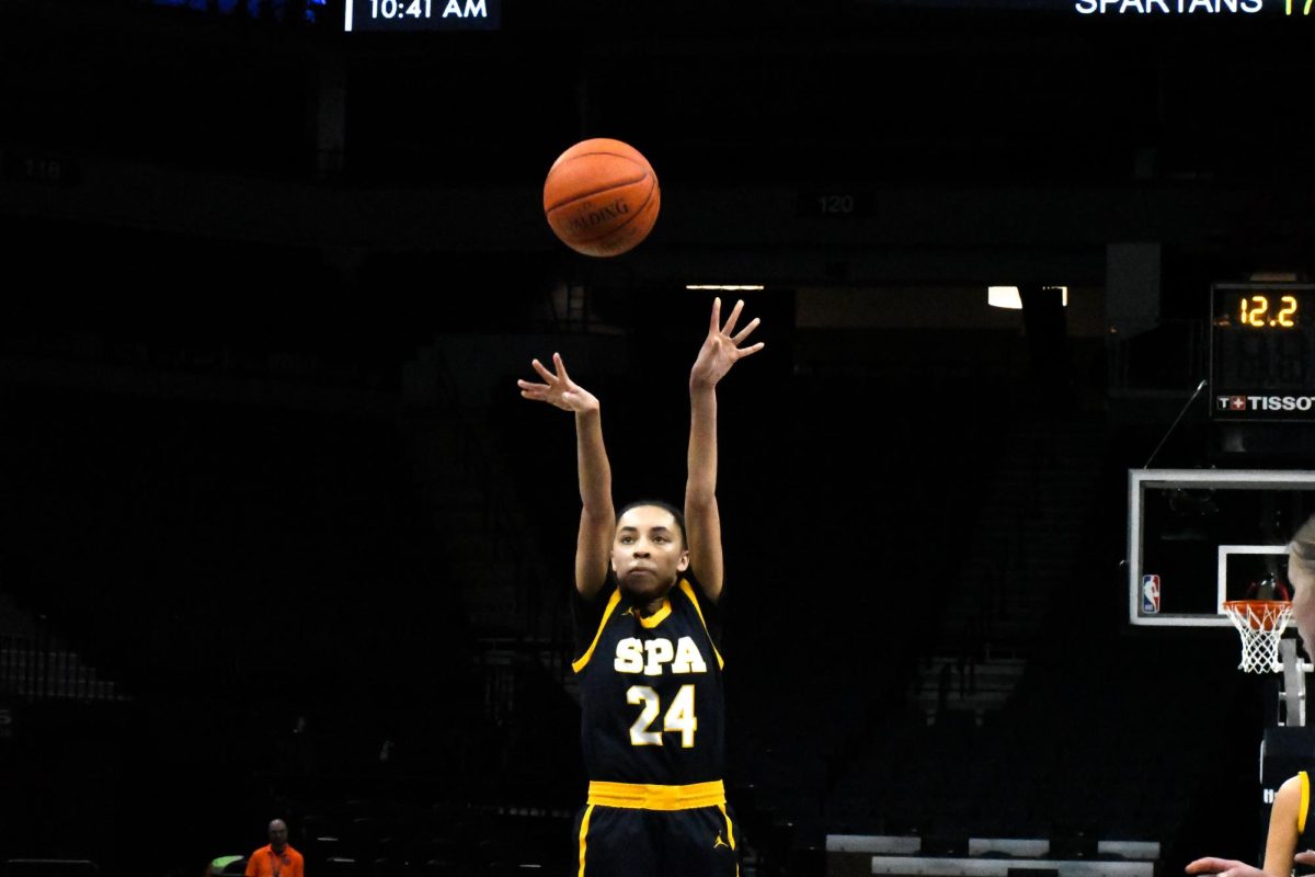 TAKE THE SHOT. Julia Taylor throws a freethrow shot and scores. 