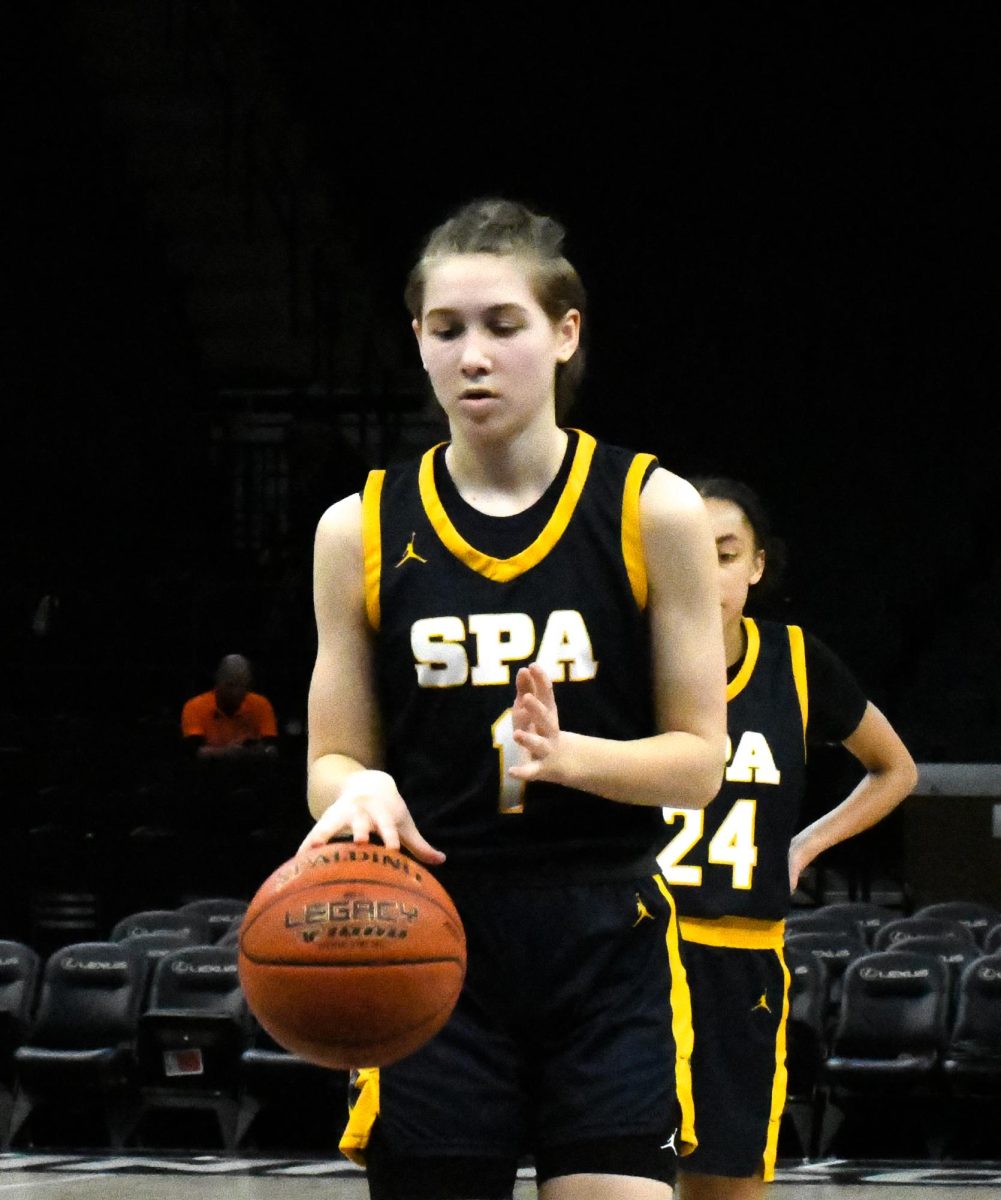 VERY CONCENTRATED. Katy Devine focuses as she prepares to throw a free-throw shot.