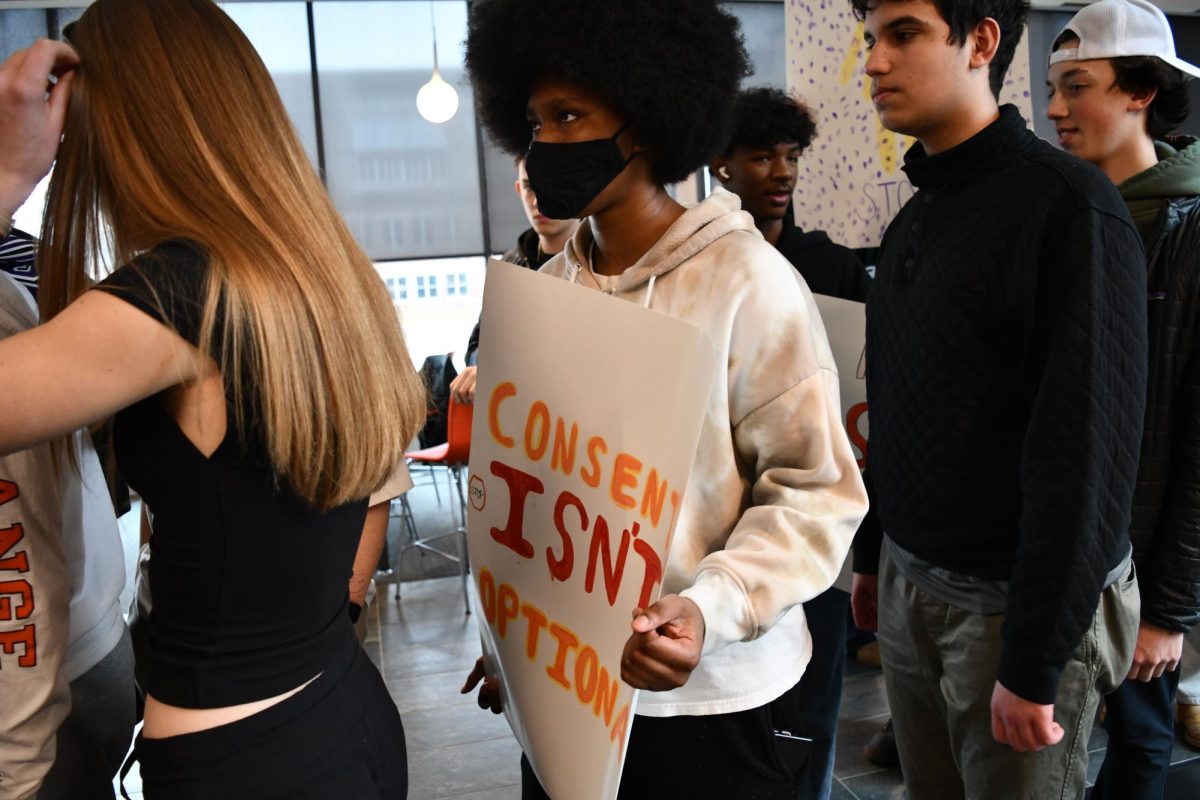 CONSENT DEFINED. Sophomore Nijah Johnson joins in on the march.
