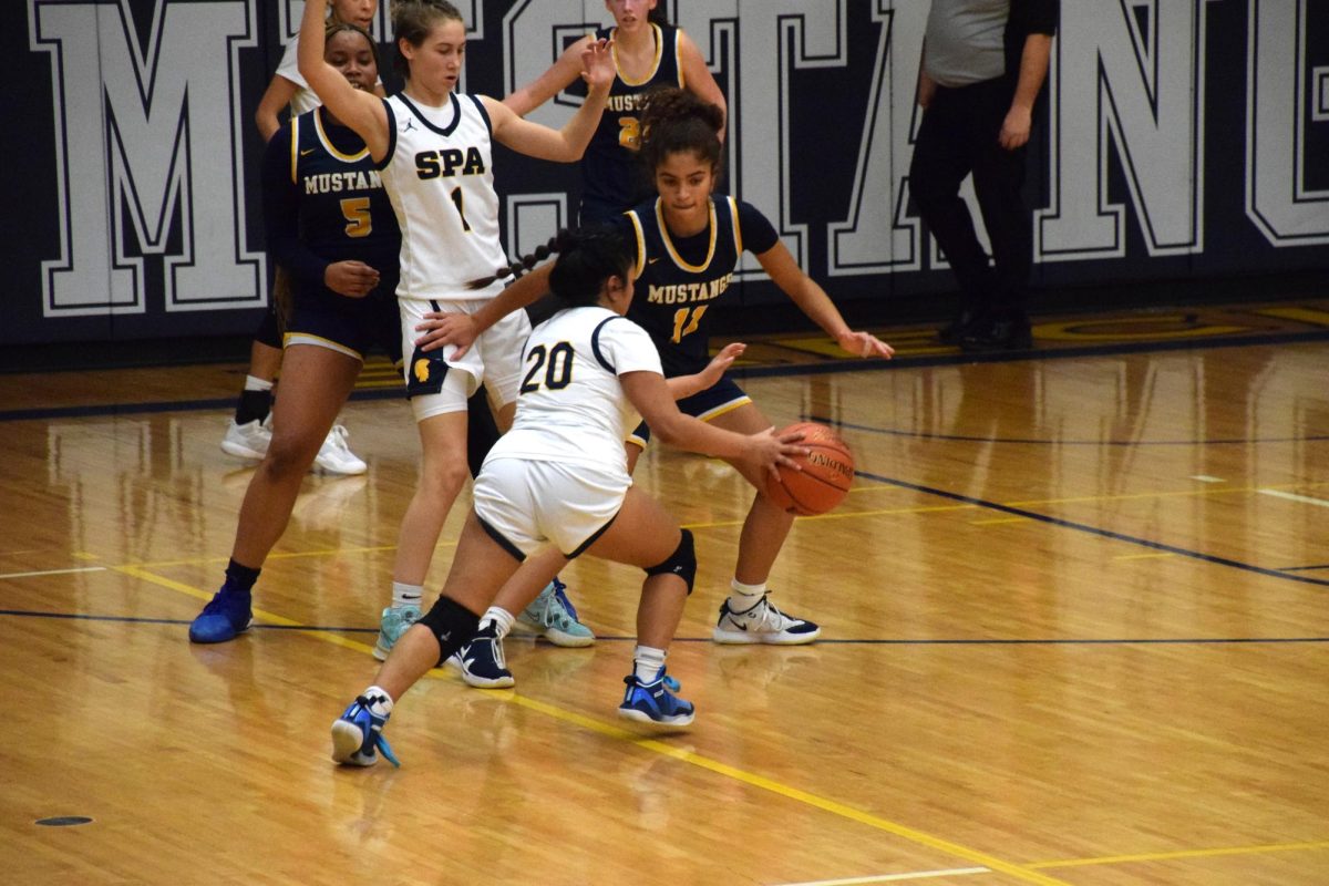 SWIFT. Senior Naomi Kempke drives to the open lane for a layup.