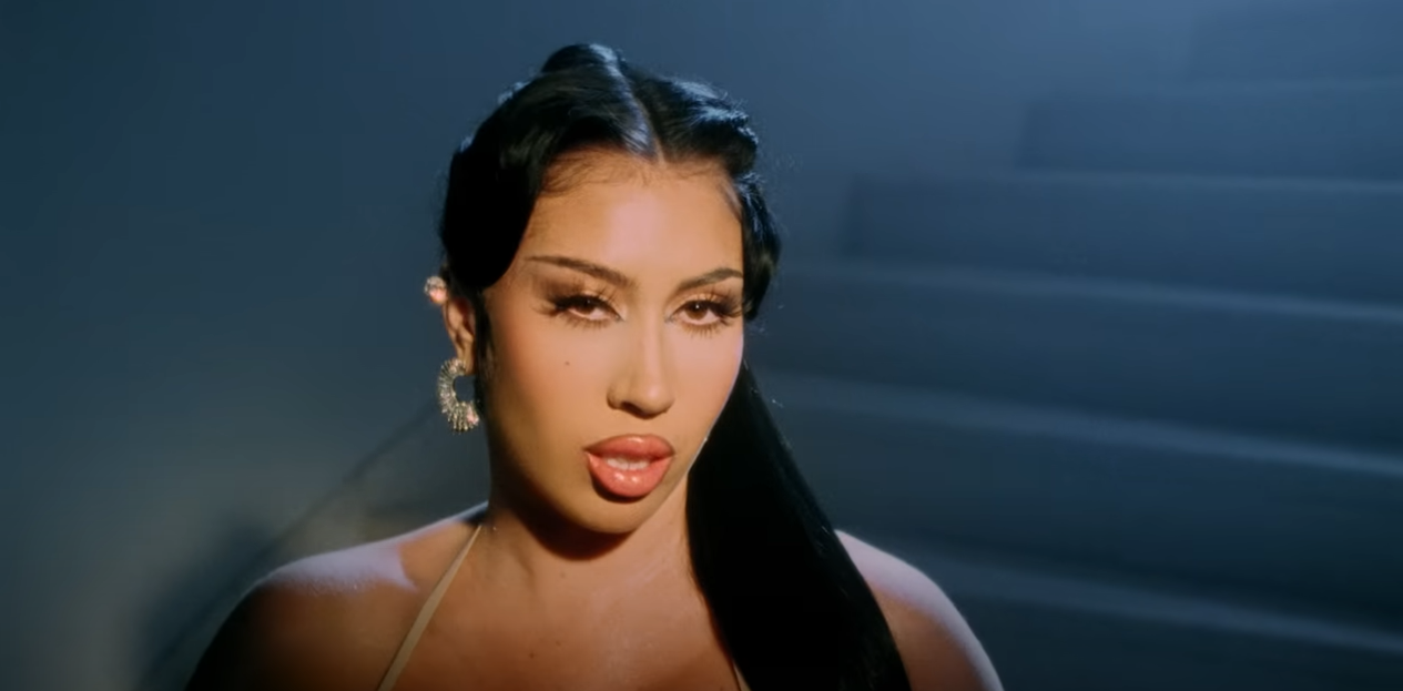Featuring reggaeton, pop and R&B influences, the tracks on “ORQUÍDEAS” are primarily in Spanish, making it Uchis’s second album comprised of songs in her first language. (Screen capture from Te Mata Official Video by Kali Uchis on YouTube)
