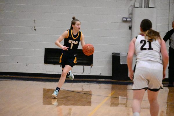 FAMILY FIRST. Devine finds a connection among her family members when it comes to basketball. “I got involved with basketball because my whole family plays it,” she said.