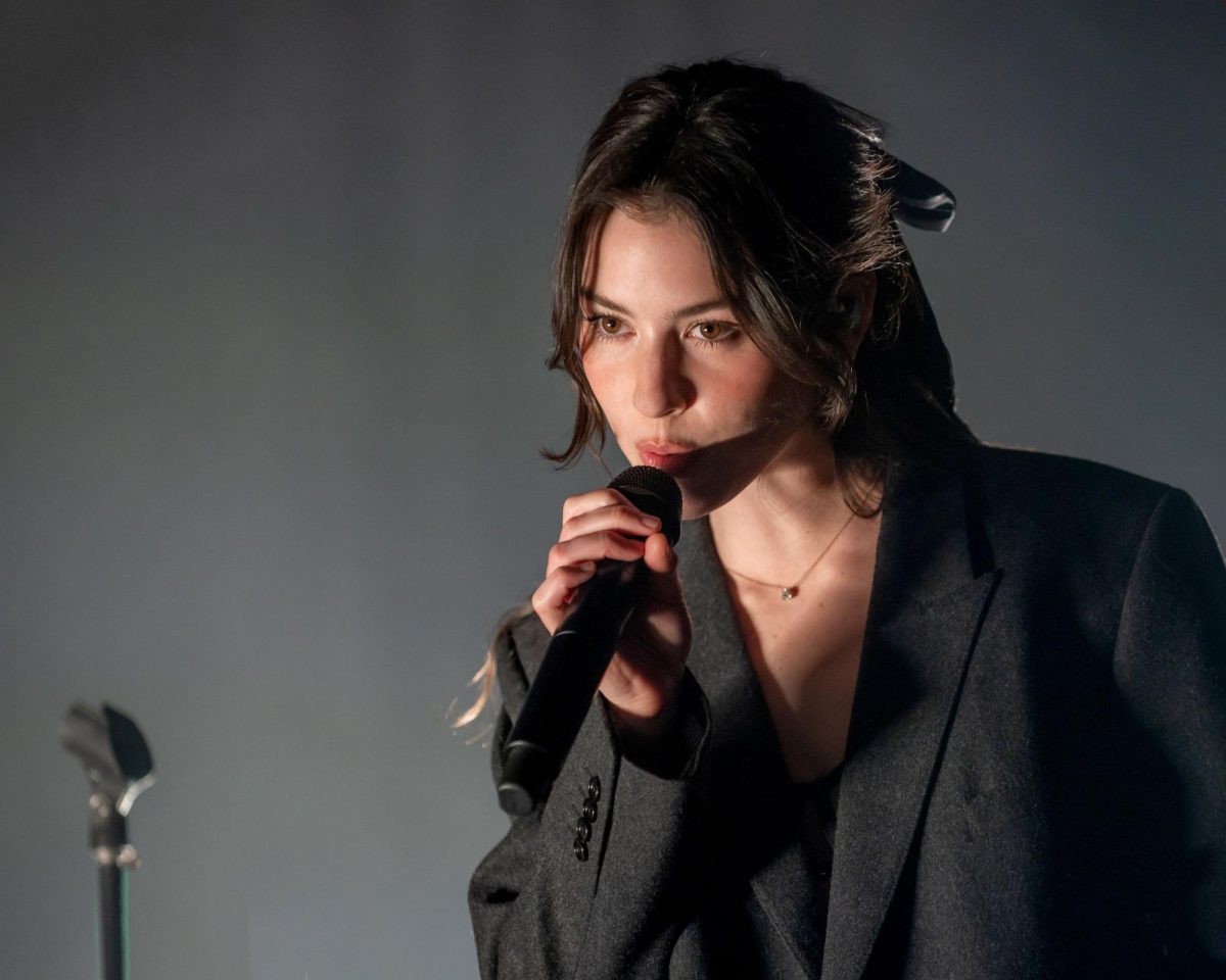 GOOD COMPANY. Gracie Abrams, Best New Artist nominee, performs in 2022. Abrams is one of eight artists in the running for the award on Sunday at the 66th Grammy Awards. 
Image by Justin Higuchi, Flickr Creative Commons. 