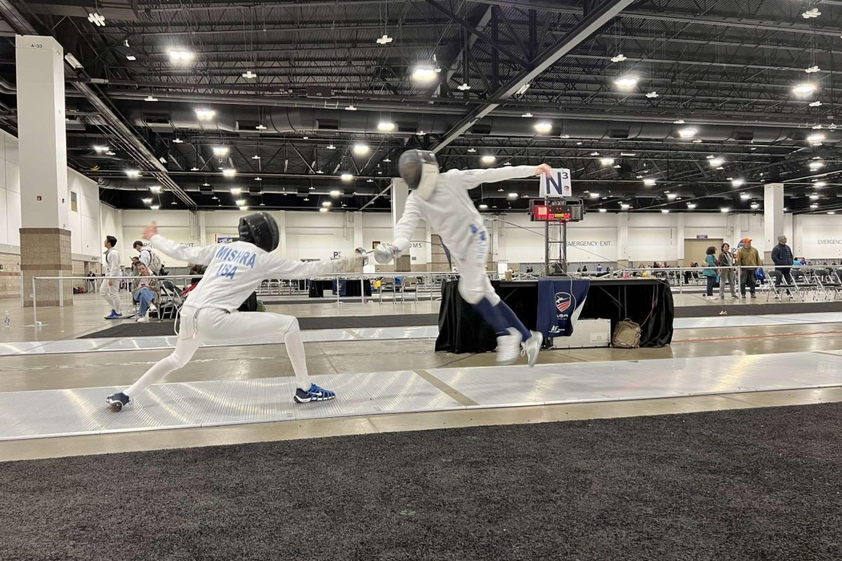 EN GUARDE. Junior Milan Mishra competes at the Junior Olympics last year. Mishra will be joined this year by teammate Maik Nguyen. “I’ve been fencing for ten years,” Mishra said.

SUBMITTED PHOTO: Milan Mishra