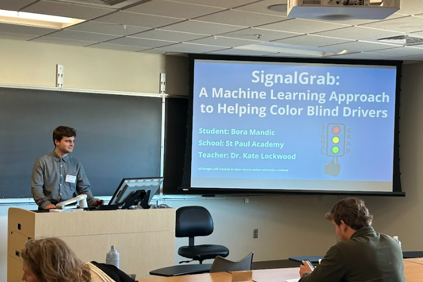 SIGNAL GRAB. Junior Bora Mandic won first place at the Junior Science and Humanities Symposium with a machine learning software aimed at helping color blind drivers. He will advance to Albuquerque, New Mexico and present his project in the national competition.