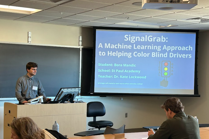 SIGNAL+GRAB.+Junior+Bora+Mandic+won+first+place+at+the+Junior+Science+and+Humanities+Symposium+with+a+machine+learning+software+aimed+at+helping+color+blind+drivers.+He+will+advance+to+Albuquerque%2C+New+Mexico+and+present+his+project+in+the+national+competition.