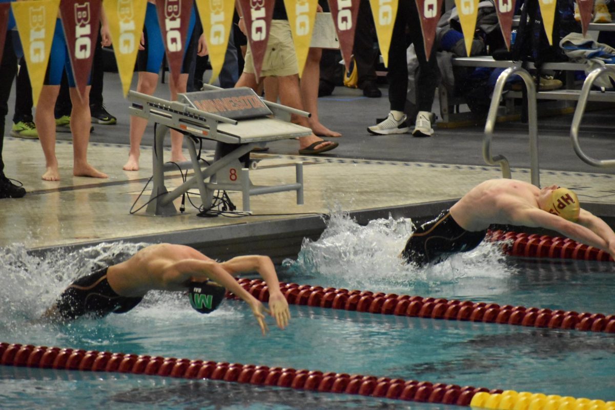 RELAY. Senior Connor Overgaard begins the first leg of the 200 medley relay with backstroke. "I'm proud of this relay," he said.