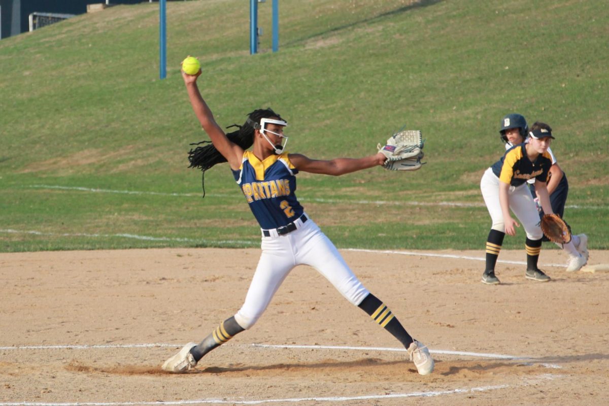 SUPERSONIC. Tamari Christopher pitches during a softball game last year. She was a 8th grader.