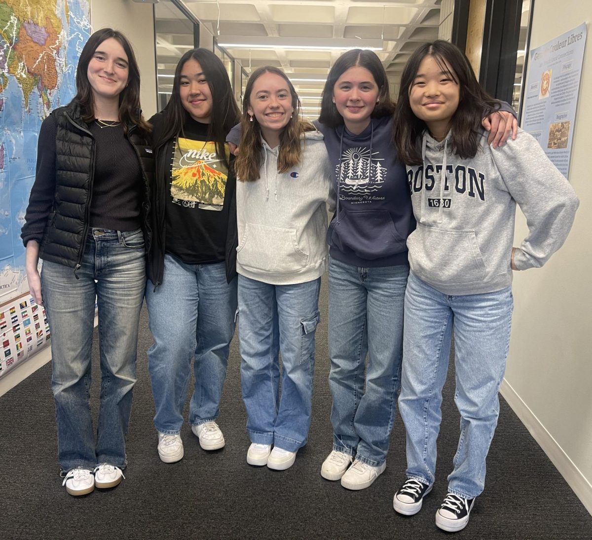 JOINED BY JEANS. Juniors Ada LaTarte, Sophia Bietz, Ava Schluender, Cassandra Overholt, and Scarlett Gibson (left to right) wear matching jeans to celebrate Denim Day. 