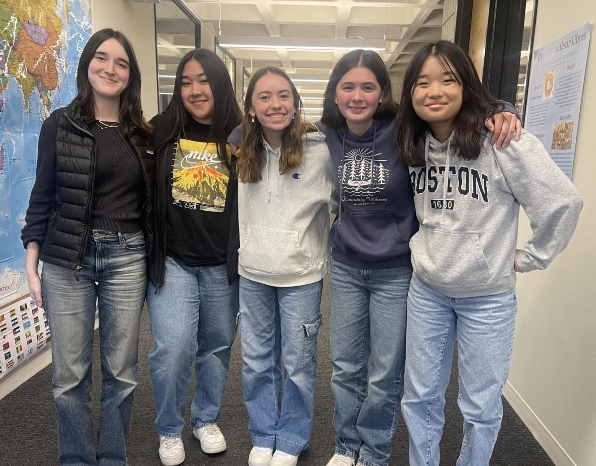 JOINED BY JEANS. Juniors Ada LaTarte, Sophia Bietz, Ava Schluender, Cassandra Overholt, and Scarlett Gibson (left to right) wear matching jeans to celebrate Denim Day. 