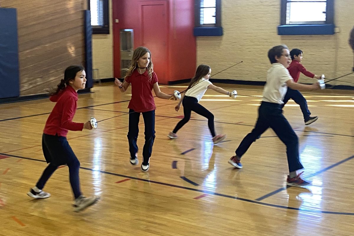 LUNGE. Lower school students practice lunging.