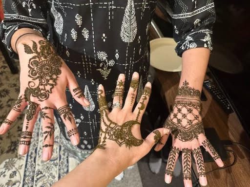 IN CELEBRATION. Intricate henna designs are on the hands of Amir Dahm’s family. “Henna (Mehndi) is done commonly for big events like weddings or Eid,” Dahm said. (Submitted Photo: Amir Dahm)