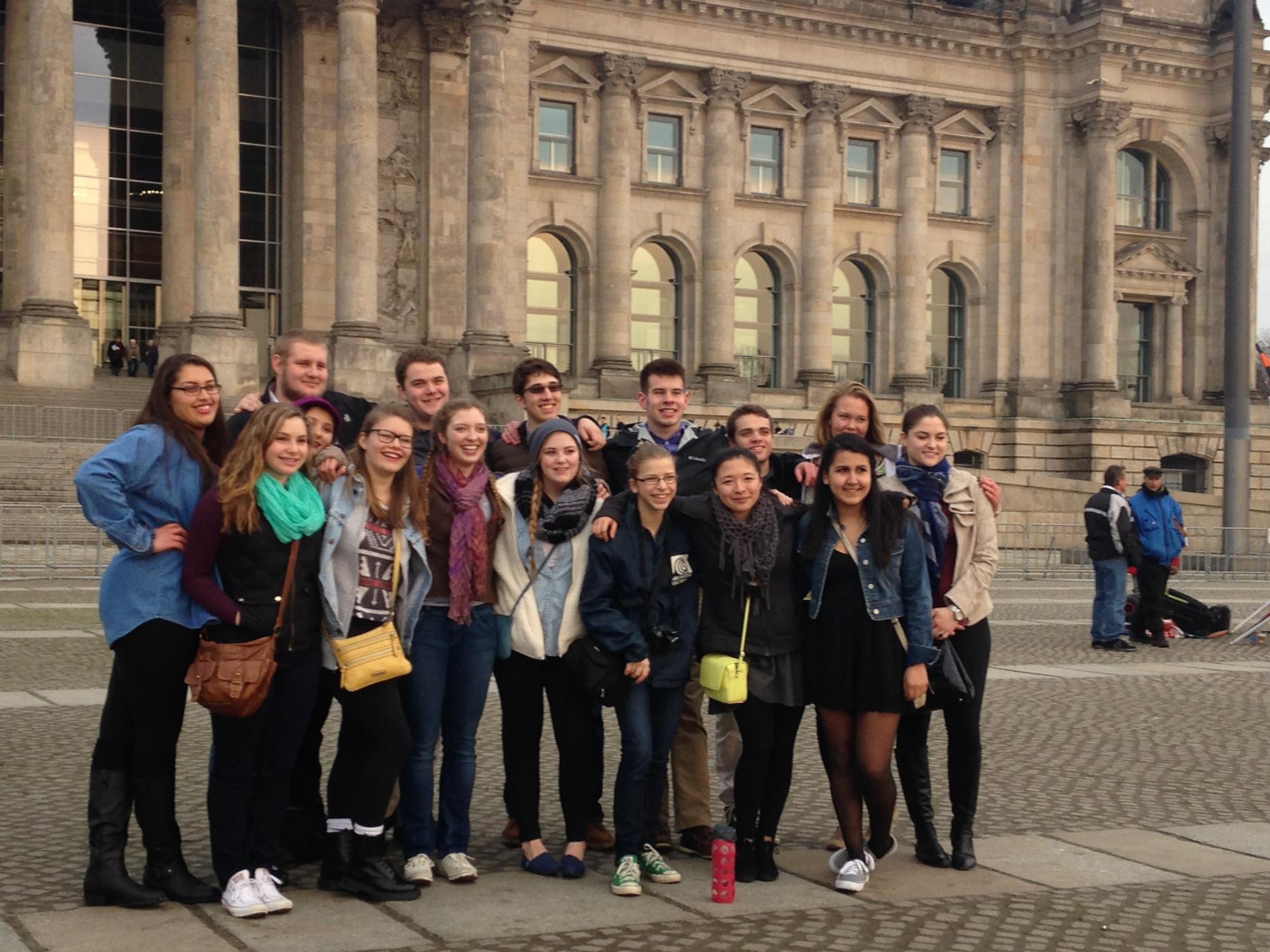 WURST. Students taking German visited Berlin and Hamburg in 2015, posing in front of Germany's capital building, der Reichstag, housing the legislative branch. Wurst means sausage in German and is similar to America's "say cheese" when taking photos. Middle school German teacher Madeleine Flom-Staab said, "While in Hamburg, we stayed with our exchange partners who had come to visit us in Minnesota in October of 2014." (Submitted photo by Madeleine Flom-Staab)
