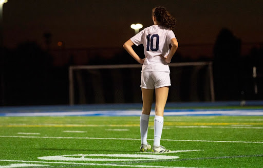 FOCUS. Hazel McCarthy plays as a defender during the fall soccer season. "Playing club soccer over the summer helps prepare [me] for school soccer,” she said.