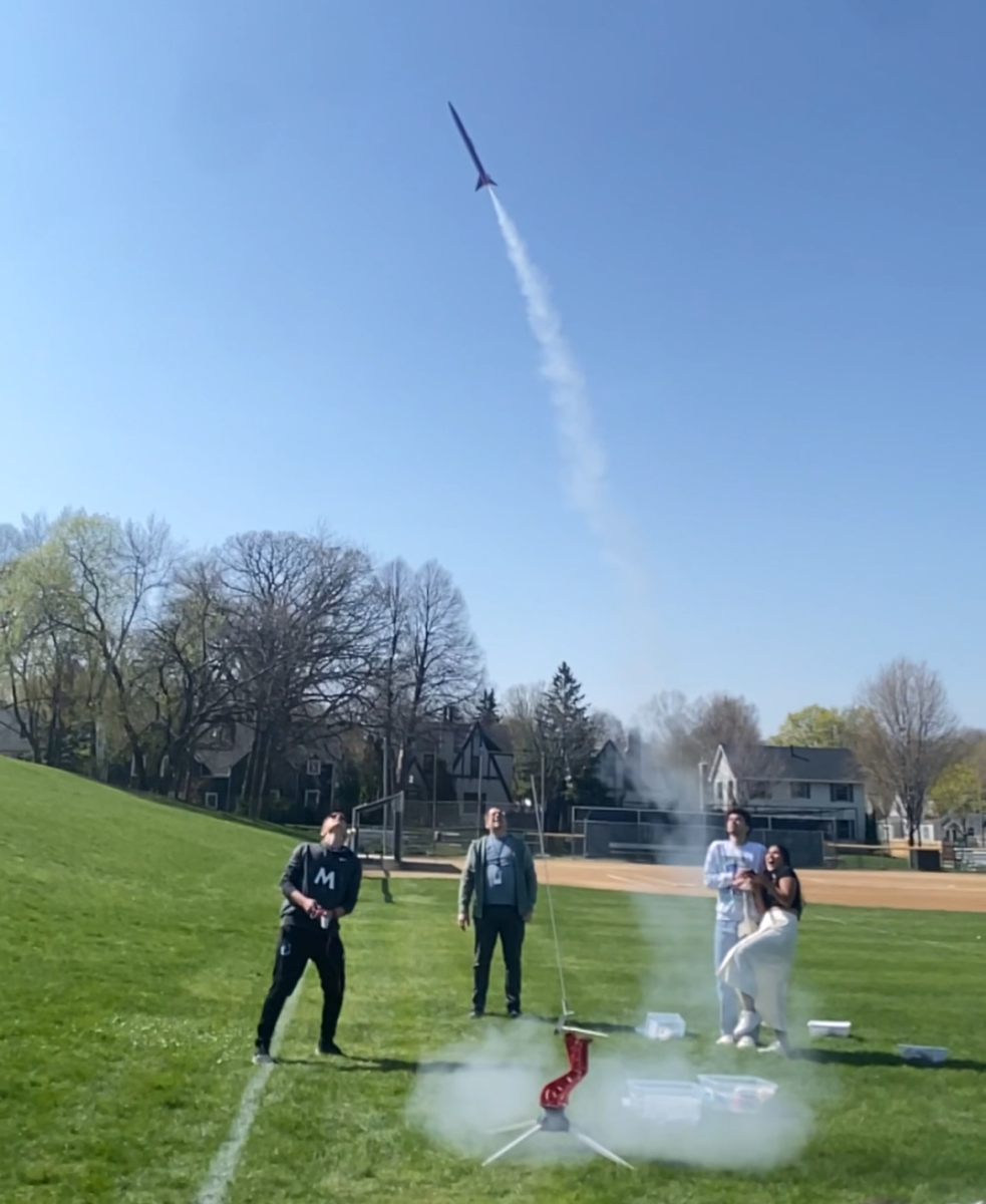 TAKE OFF. Sophomore James Welsh watches as his rocket rises into the air. The Aerospace engineering class held their final tests on May 1. Getting to launch the rocket that was fun because it was just like a month of really hard work all coming together, Welsh said. 
Photo submitted by Maren Overgaard.