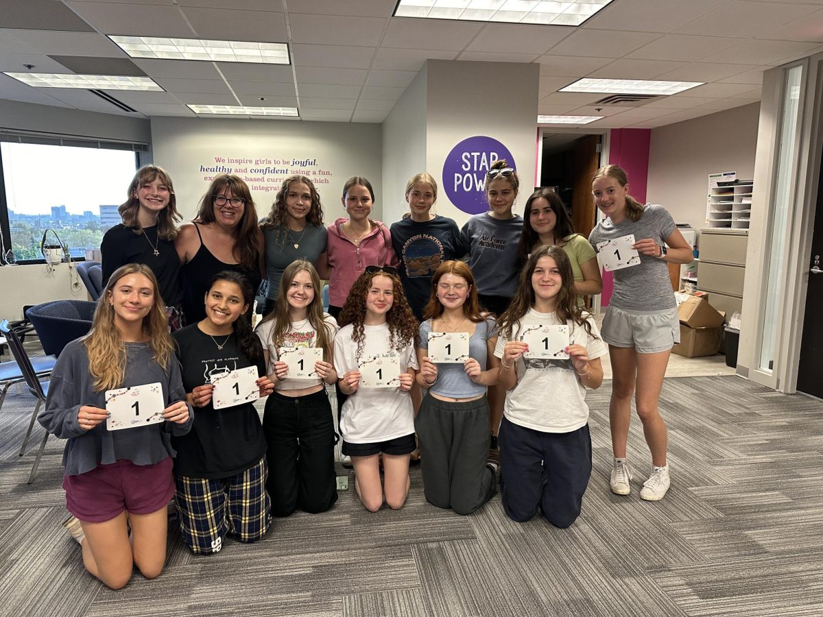 HERSPACE VOLUNTEERS. HerSpace facilitated a volunteering event with Girls on the Run Minnesota May 16. The volunteers packed bags, made team signs and more. "It was such a cool experience getting to see the headquarters and it was so fun to see everyone there," said Junior Sydney Zimmerman.
