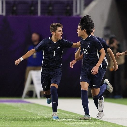 CELEBRATION. Freshman Erik Bjorgvinsson hypes up his teammate, senior Orion Kim, to celebrate.
Photo submitted by Erik Bjorgvinsson