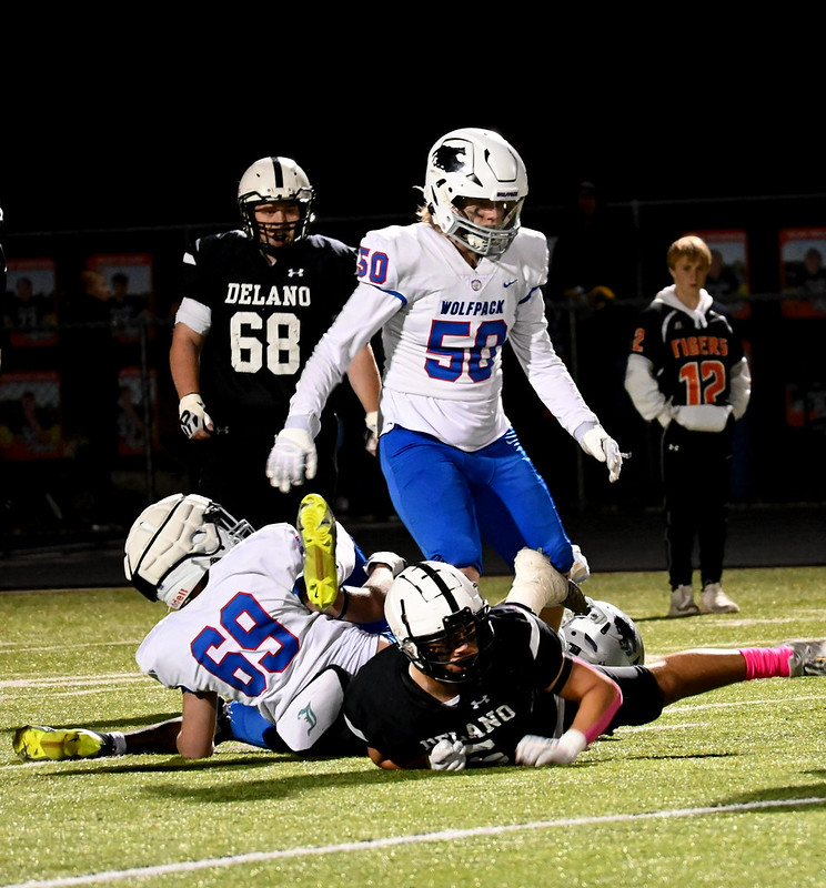 MY BALL. Coblentz wrestles another player for the ball.