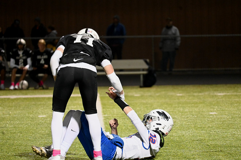 GIVING A HAND. The crowd cheered as the Tigers and Wolfpack maintained proper sportsmanship during the nail biting game.