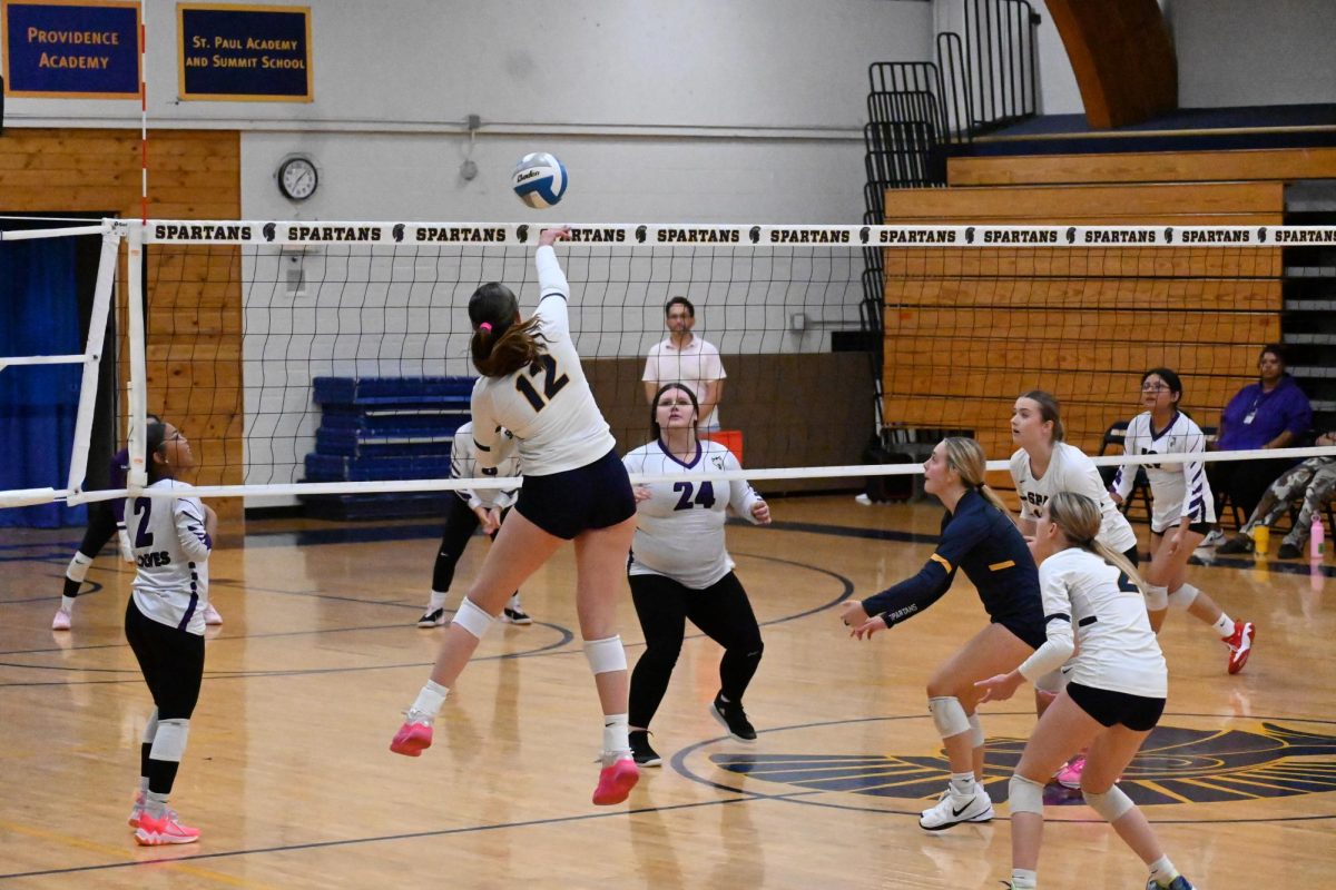 SMACK, the sound the ball made when Outside Murphy Miltner Spiked the ball.