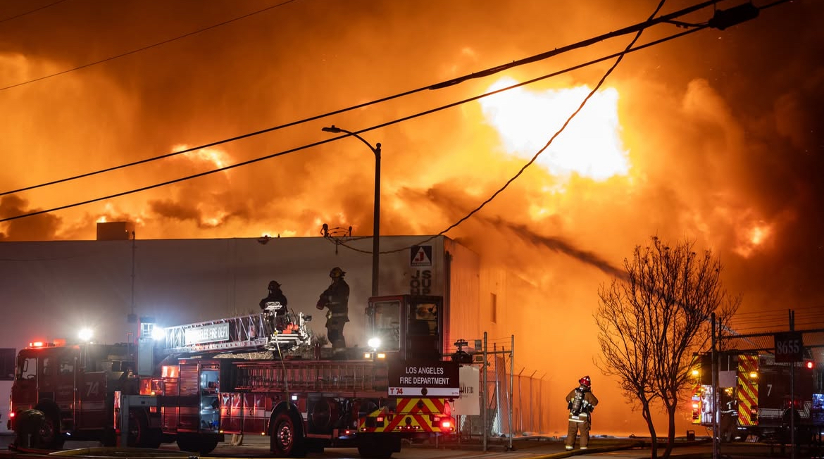 FIRST ON SITE. LAFD firefighters respond to a burning building. In January various fires ripped across southern California, particularly Los Angeles