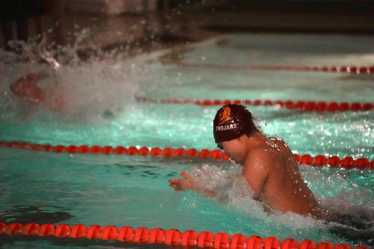 PUSHING THROUGH. Junior Ben Lee from SPA is just shortly behind a central swimmer in the 100-yard breaststroke.