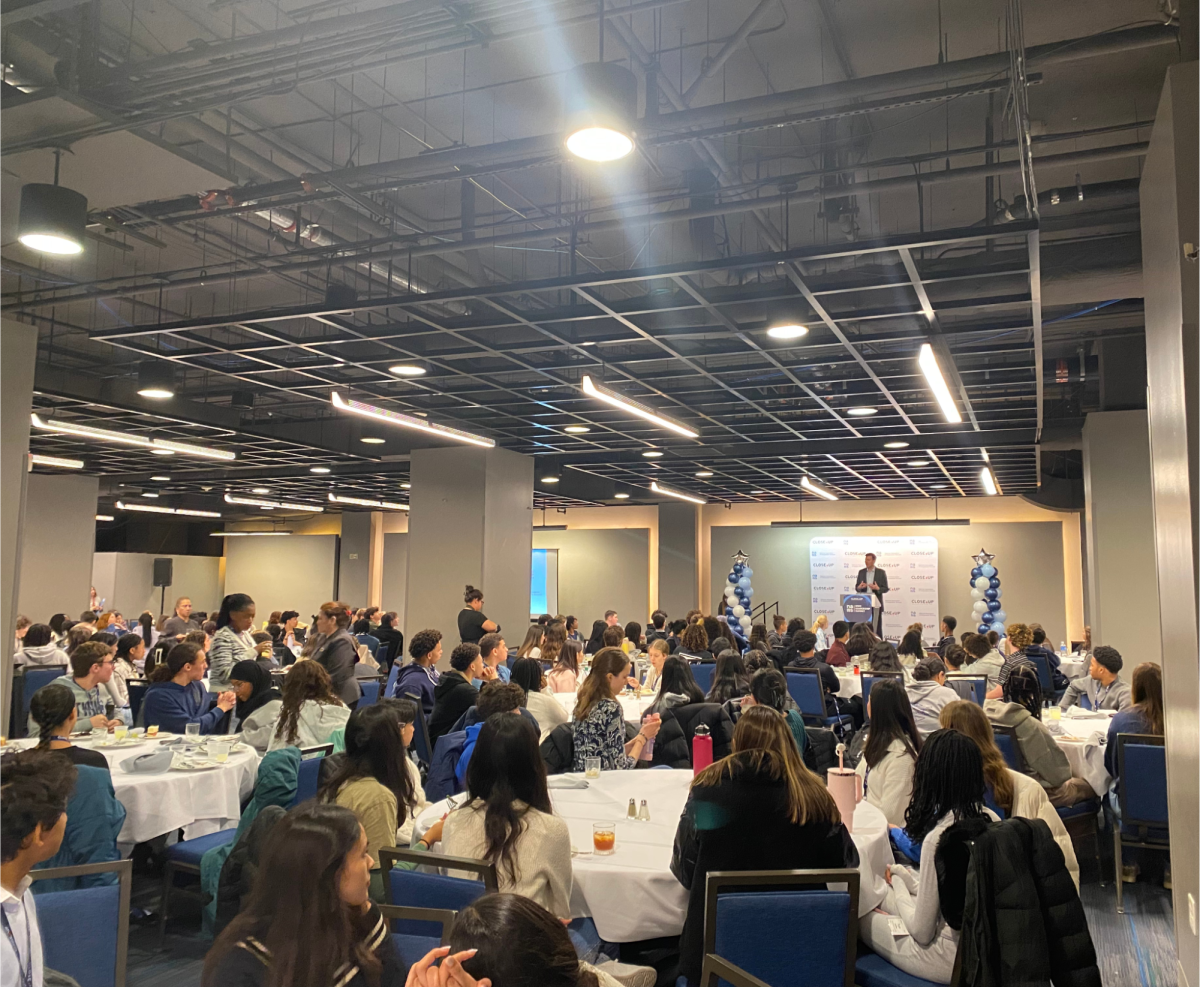 OPENING ORIENTATION. The hall is filled with students from all over the nation, about 400 total. Many events took place in this hall during the three days of the conference. Speaking on the podium is CloseUp CEO Eric Adydan.